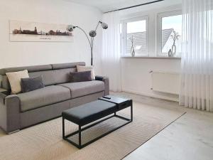 Posezení v ubytování LIVATION - Apartments Hamm-Mitte - 2 Zi - Nespresso - SmartTV - freeWiFi - ausgestattete Küche - 24h Check-In - bis 4 Pers pro Apartment