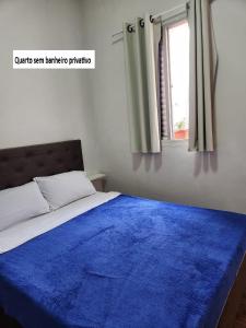 Fujima Hostel客房内的一张或多张床位