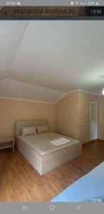 Postel nebo postele na pokoji v ubytování Konstantin House