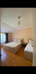 Postel nebo postele na pokoji v ubytování Konstantin House + 19 fotografií