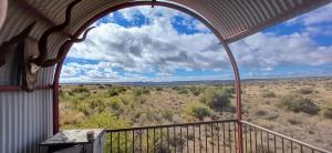 a view from the balcony of a gazebo at Jagterswa Adam se Uitspanning in Orania