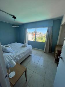 Cama ou camas em um quarto em ZAG Coliving Punta del este