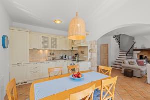 Kuchyň nebo kuchyňský kout v ubytování Villa Mia Lea