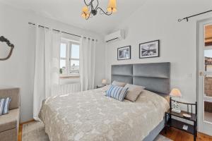 Postel nebo postele na pokoji v ubytování Villa Mia Lea + 28 fotografií