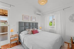 Postel nebo postele na pokoji v ubytování Villa Mia Lea