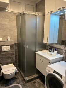 Ванна кімната в Hello One Apartman