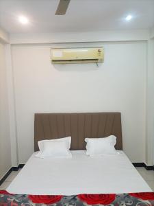 Postel nebo postele na pokoji v ubytování Shivarpanam Home Stay + 15 fotografií