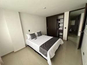 Postel nebo postele na pokoji v ubytování Apartamento Nuevo Laureles- La 70