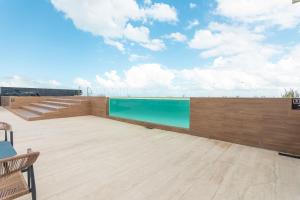 Hồ bơi trong/gần Musa del Carmen By Boutique Apartments MX