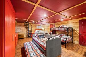 a room with two bunk beds and a couch at Tequila Moon in Sevierville +56 photos