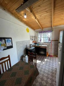 Postel nebo postele na pokoji v ubytování Alojamiento Lunas en Chuy con Baño Privado + 10 fotografií