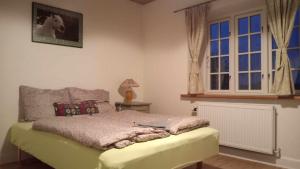 Postel nebo postele na pokoji v ubytování Søstgård B&B