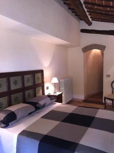Llit o llits en una habitació de Locanda Petrella