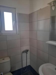 Koupelna v ubytování Απεριόριστη θέα