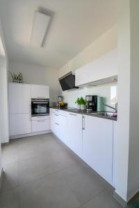 Η κουζίνα ή μικρή κουζίνα στο Ferienwohnung in Warburg