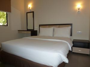 Postel nebo postele na pokoji v ubytování Hotel Hong