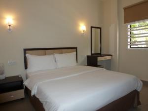 Postel nebo postele na pokoji v ubytování Hotel Hong