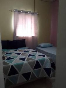 Voodi või voodid majutusasutuse Tu segundo hogar toas