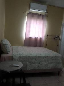 Voodi või voodid majutusasutuse Tu segundo hogar toas