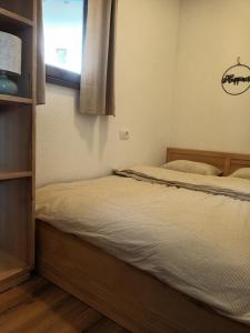 Postel nebo postele na pokoji v ubytování Tiny house