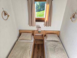 Postel nebo postele na pokoji v ubytování Tiny house