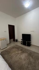 TV o dispositivi per l'intrattenimento presso Qantab Village Stay