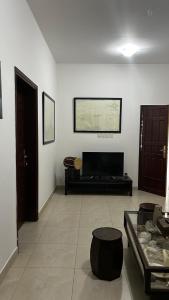 Area soggiorno di Qantab Village Stay
