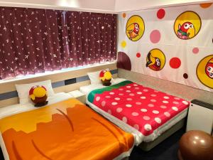 Ein Bett oder Betten in einem Zimmer der Unterkunft Henn na Hotel Premier Kagoshima Tenmonkan