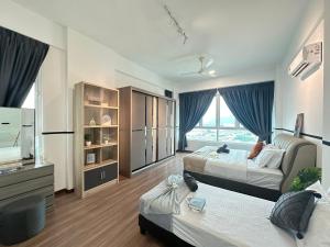 Postel nebo postele na pokoji v ubytování Ipoh D Festivo Suites 6-10pax 10mins to Sunway Tambun by IWH