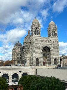 a large building with domes on top of it at Escapade marseillaise in Marseille