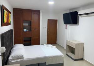 TV a/nebo společenská místnost v ubytování Hotel Vans Valledupar