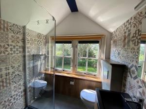 Koupelna v ubytování Villa in Netherlands with Hot Tub & Garden