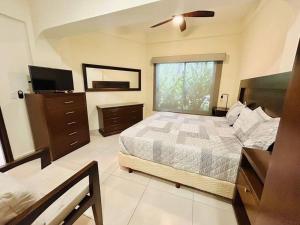 Postel nebo postele na pokoji v ubytování Departamento frente al mar en zona cerritos + 24 fotografií