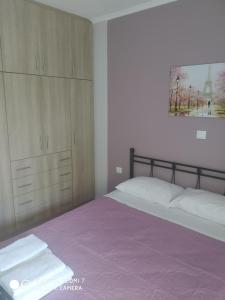 Postel nebo postele na pokoji v ubytování Chris&Chris Luxury apartment
