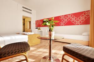 Posezení v ubytování Ruth Daniel Residence + 37 fotografií