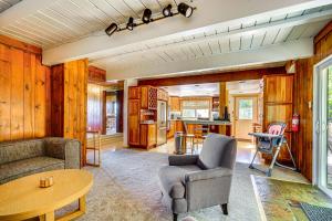 a living room with a couch and a table at 3 Mi to Ski Slopes Park City Retreat with Game Room in Park City