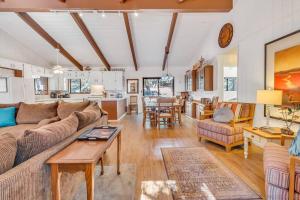 a living room with a couch and a table at Pine Hills Cabin in Julian in Julian