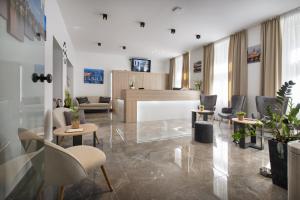 TV a/nebo společenská místnost v ubytování Prague Season Hotel