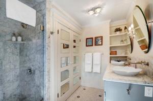 a bathroom with a sink and a shower at Sonoma Victorian In Heart Of Sonoma in Sonoma +32 photos