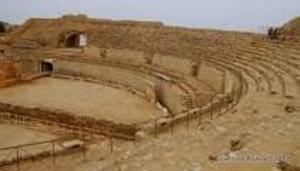 an empty amphitheater in an arena at Plaça De La Font in Tarragona