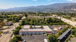 an aerial view of a hospital and a parking lot at Motel 6-Carpinteria, CA - Santa Barbara - South in Carpinteria