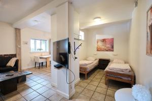 Postel nebo postele na pokoji v ubytování Askegaarden Apartments