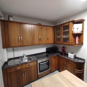 Køkken eller tekøkken på H & L Fogar do Camiño + 15 billeder