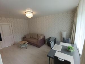 Posezení v ubytování New Comfortable Apartment in center + 9 fotografií