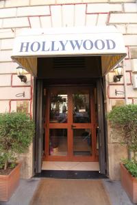 a hollywood sign over the door of a building at Hotel Hollywood in Rome