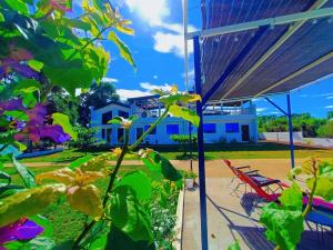 a view of a house from the garden at Concetta Inn in Manolo Fortich