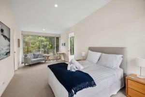 Ένα ή περισσότερα κρεβάτια σε δωμάτιο στο Yarringa Beach House