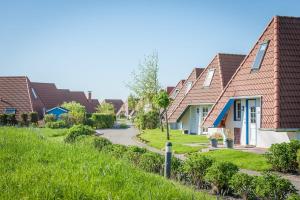 a row of houses in a residential neighborhood at Ferienhaus "Sprenger" Hans Albers 11 in Wremen