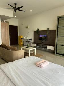 a bedroom with a bed and a living room at Mount Austin #Palazio B2 Super City View 1-2Pax #MSPro in Johor Bahru +42 photos