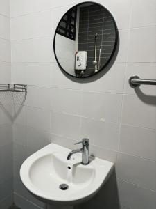 a bathroom with a sink and a mirror at Mount Austin #Palazio B2 Super City View 1-2Pax #MSPro in Johor Bahru